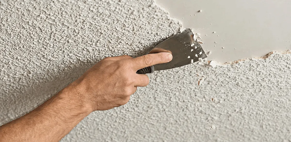 Popcorn ceiling removal scraping off textured ceiling finish in Omaha, NE