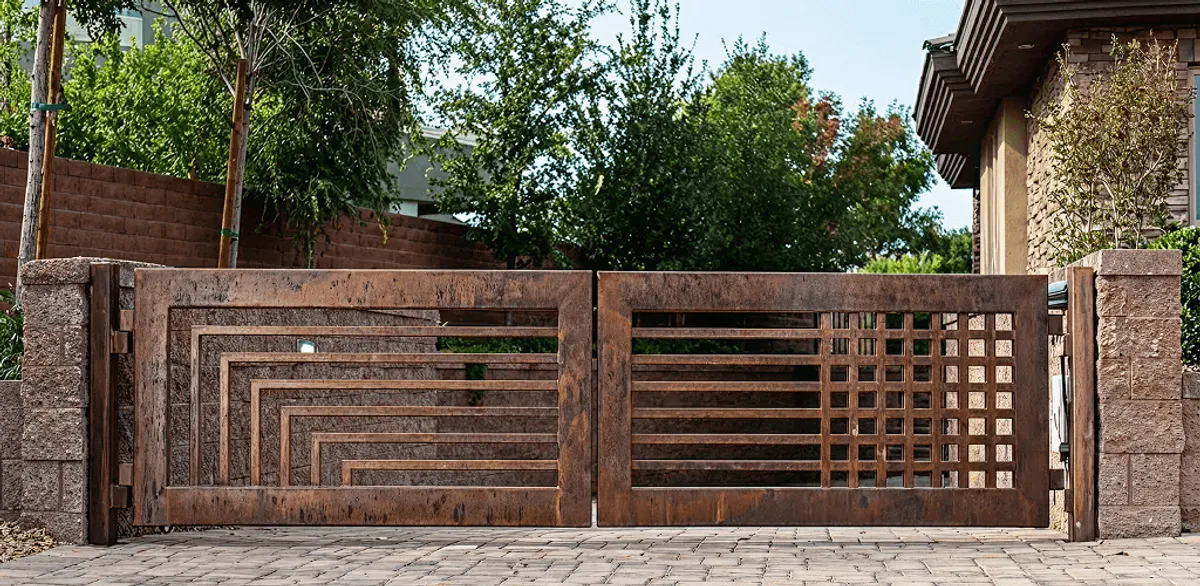 Custom driveway gate installation for a home entrance in Omaha, NE