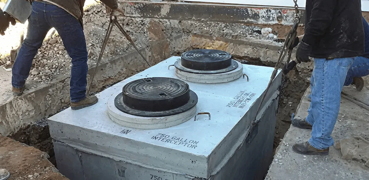 Grease trap installation for a commercial property drainage system in Omaha, NE