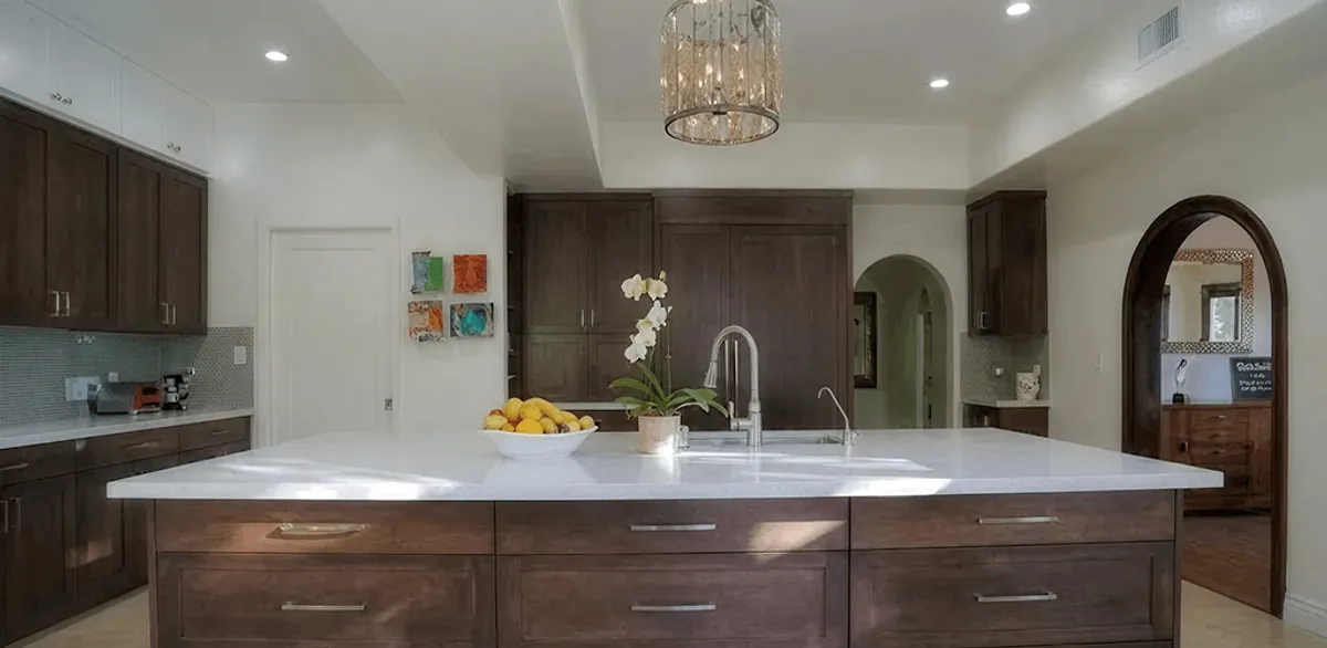 Cabinet refacing project with updated kitchen cabinets and island in Omaha, NE